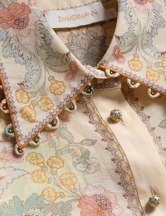 Rebellion-blus med citronblommönster online Rebellion-blus med citronblommönster online