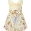 Rebellion figursydd playsuit i färgen Lemon Aviary online