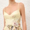 Rebellion figursydd playsuit i färgen Lemon Aviary online