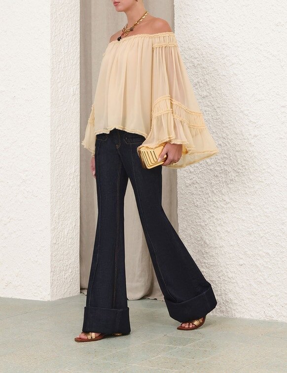 Rebellion Fray Flutter-blus i krämfärg online Rebellion Fray Flutter-blus i krämfärg online