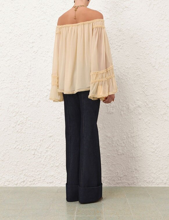 Rebellion Fray Flutter-blus i krämfärg online Rebellion Fray Flutter-blus i krämfärg online